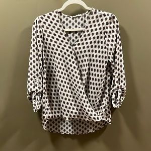 Size small blouse with unique pattern. Perfect for work!